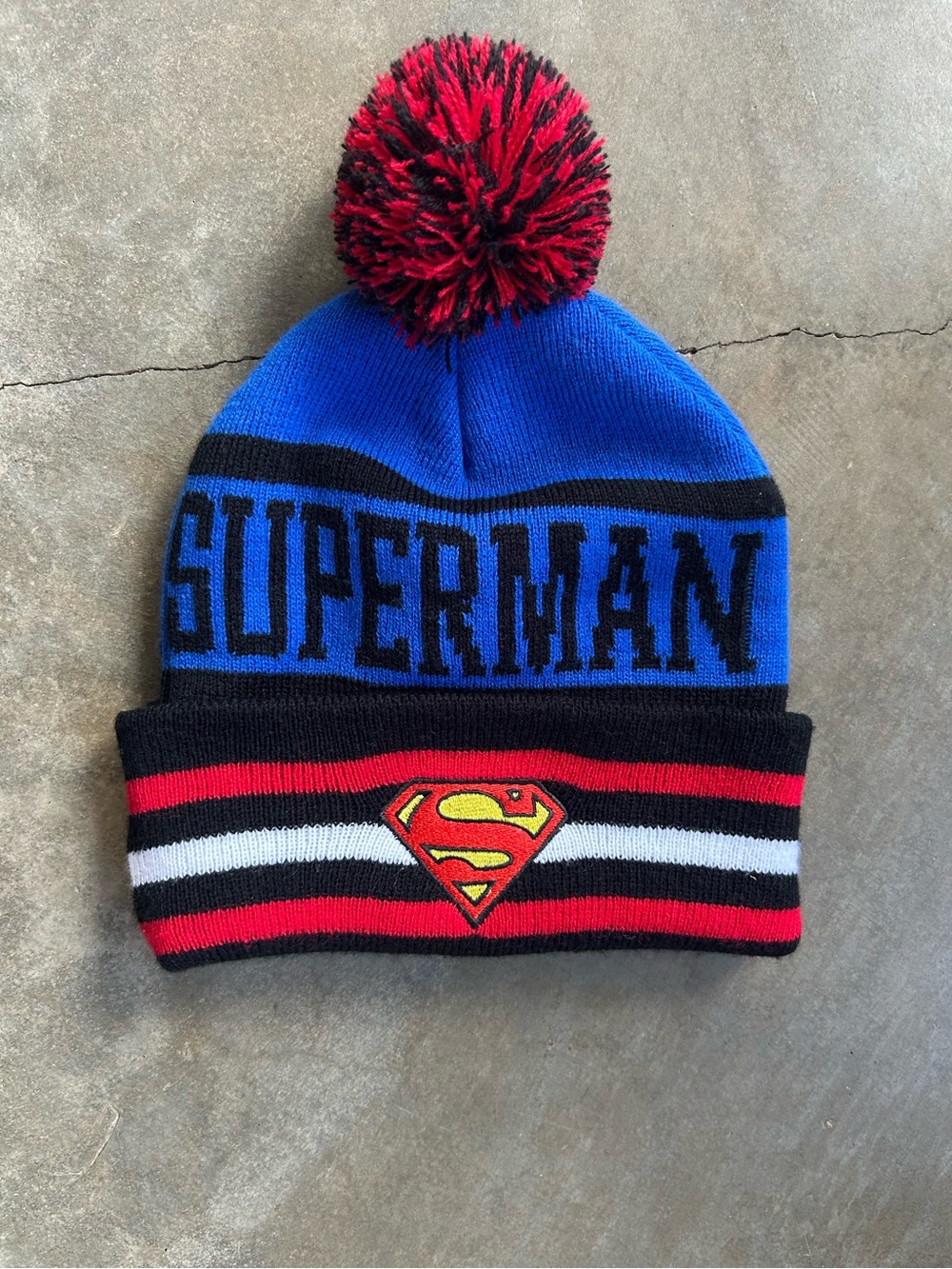 DC Comics Superman Knit Pom Beanie Hat - Blue, Red, Black, White, Yellow